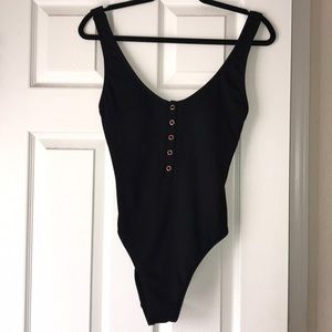 bathing suit/body suit